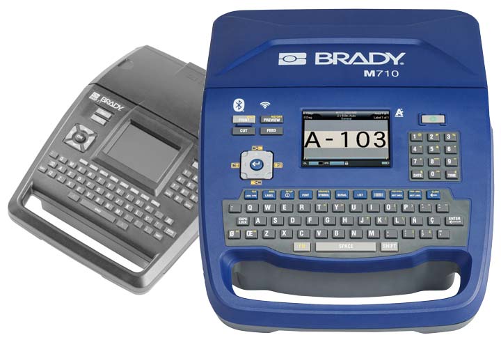 Une étiqueteuse Brady M710 devant une étiqueteuse BMP71 grisée.
